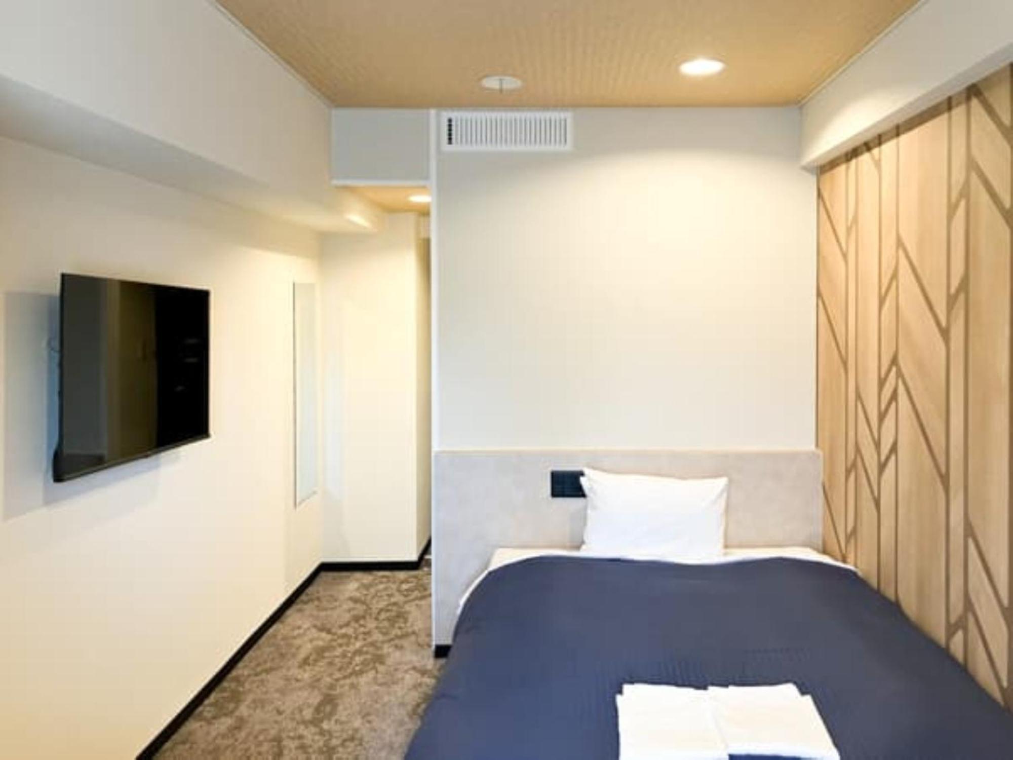 Hotel Livemax Budget Yokohama Kannai Quarto foto
